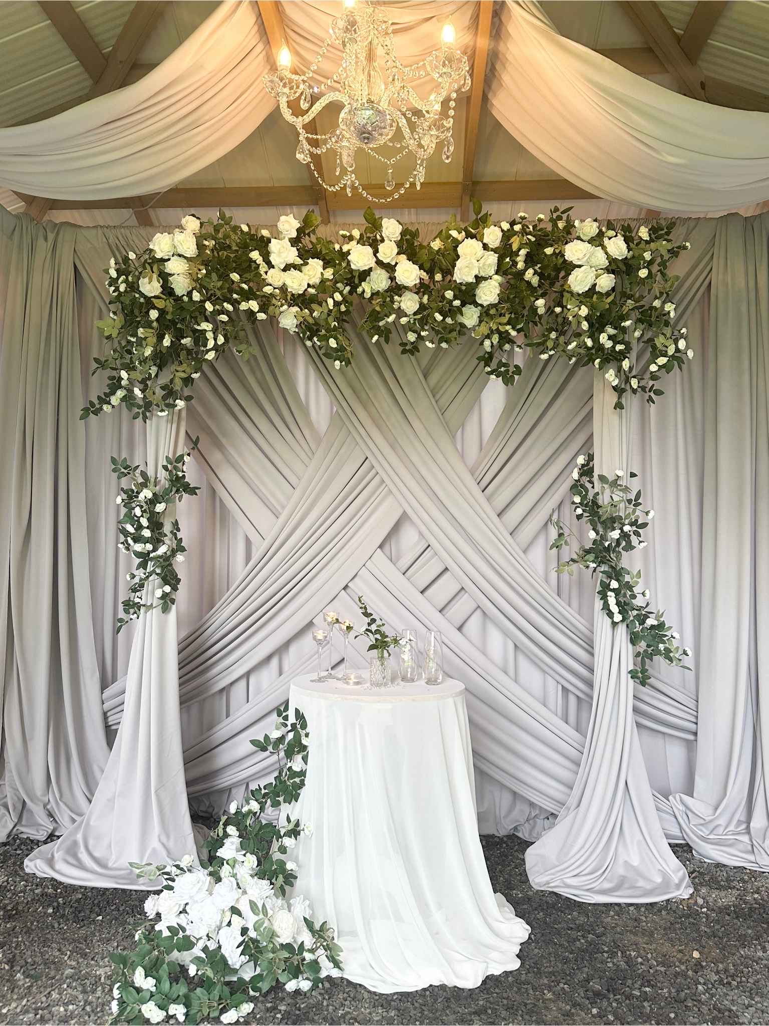Layered Drapery Stage Backdrop custom structure with dove, white, and emerald styling for a wedding in the greater Seattle area