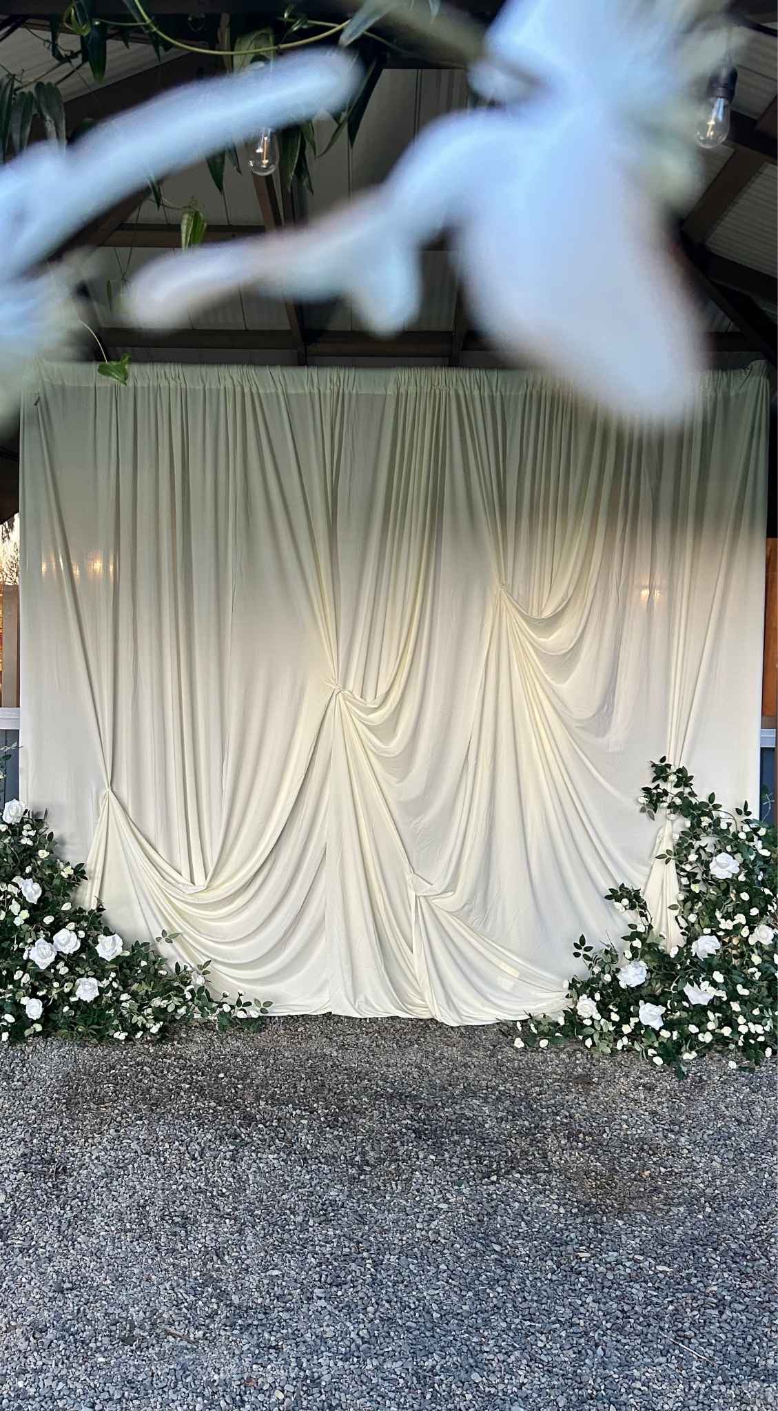 Drapery Backdrop custom structure with ivory and emerald styling for a birthday in the greater Seattle area