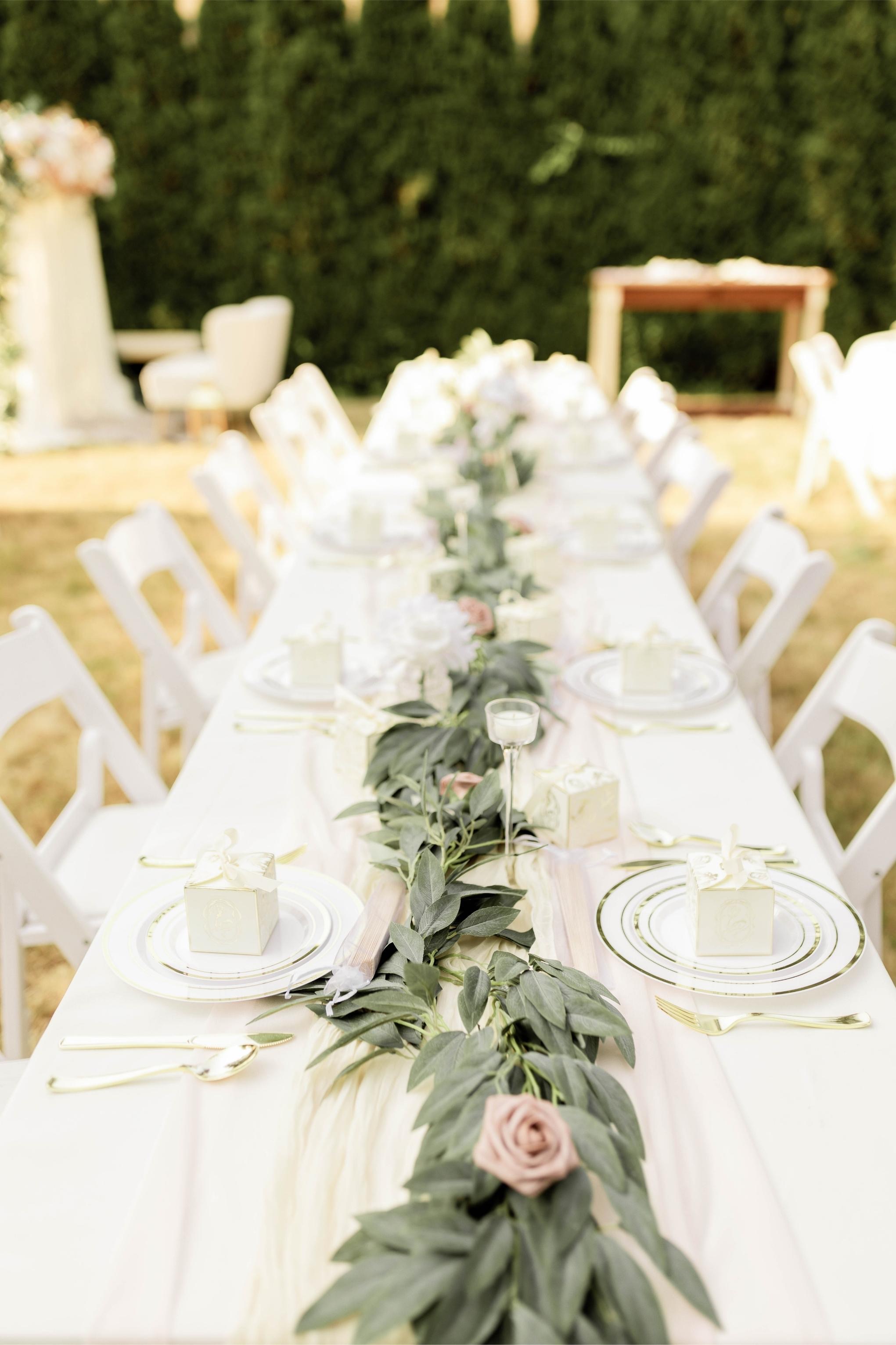 Sage, ivory, and blush floral styling and custom decor styled for a wedding reception in the greater Seattle area