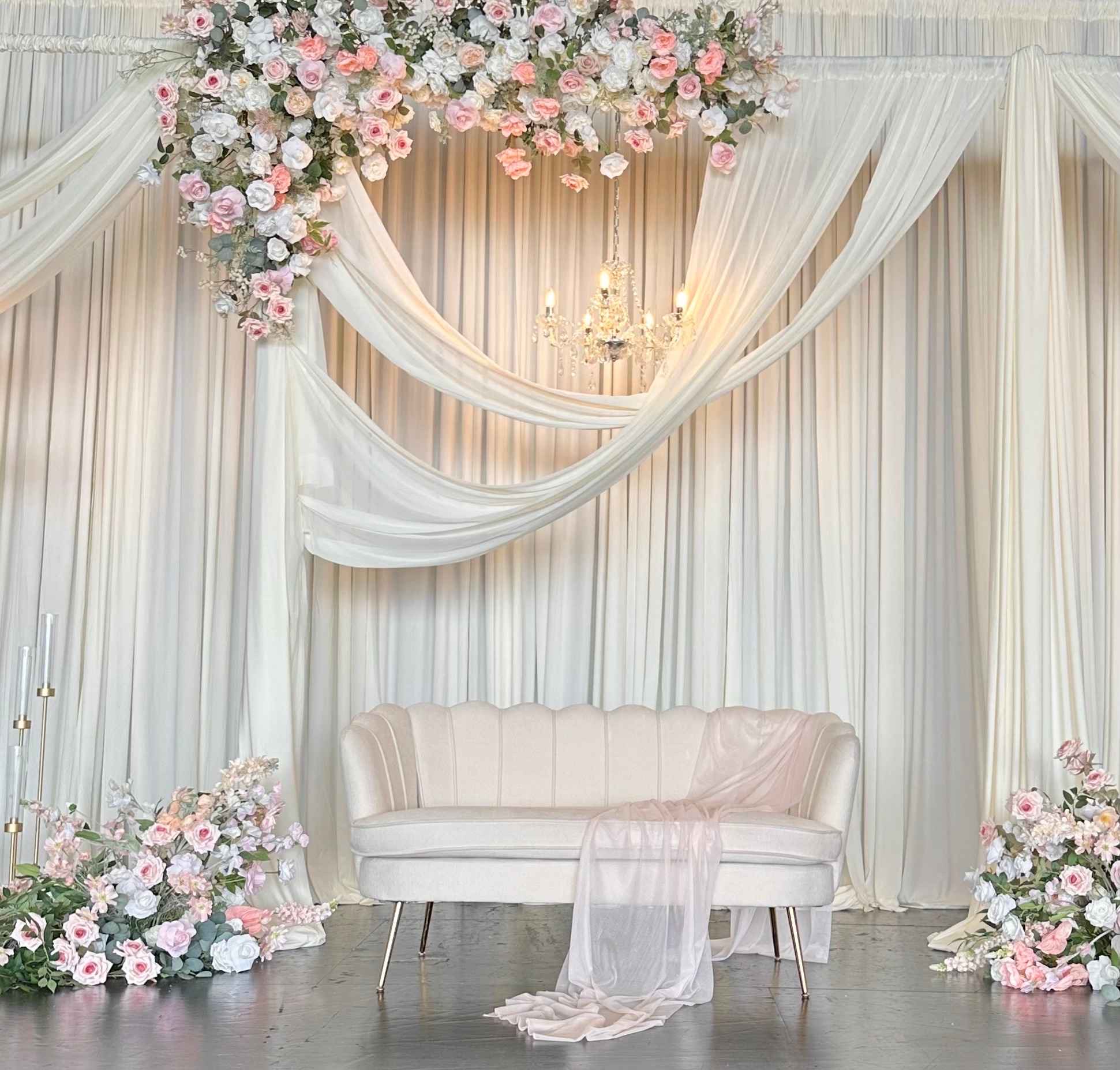 Signature Stage Setup custom structure with ivory, blush, and sage styling for a wedding