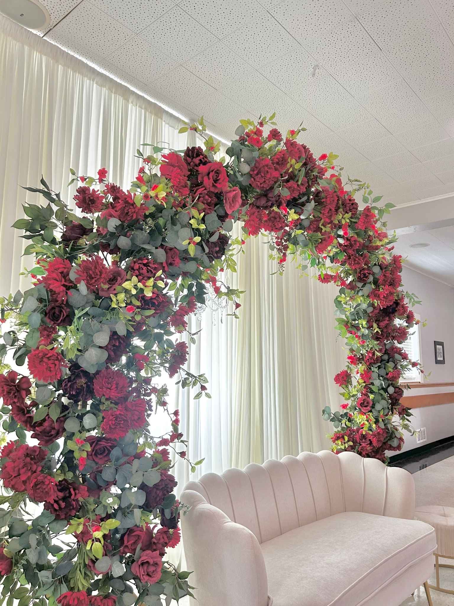 Luxury burgundy, emerald, and ivory organic floral styling for a wedding reception centerpiece in the greater Seattle area