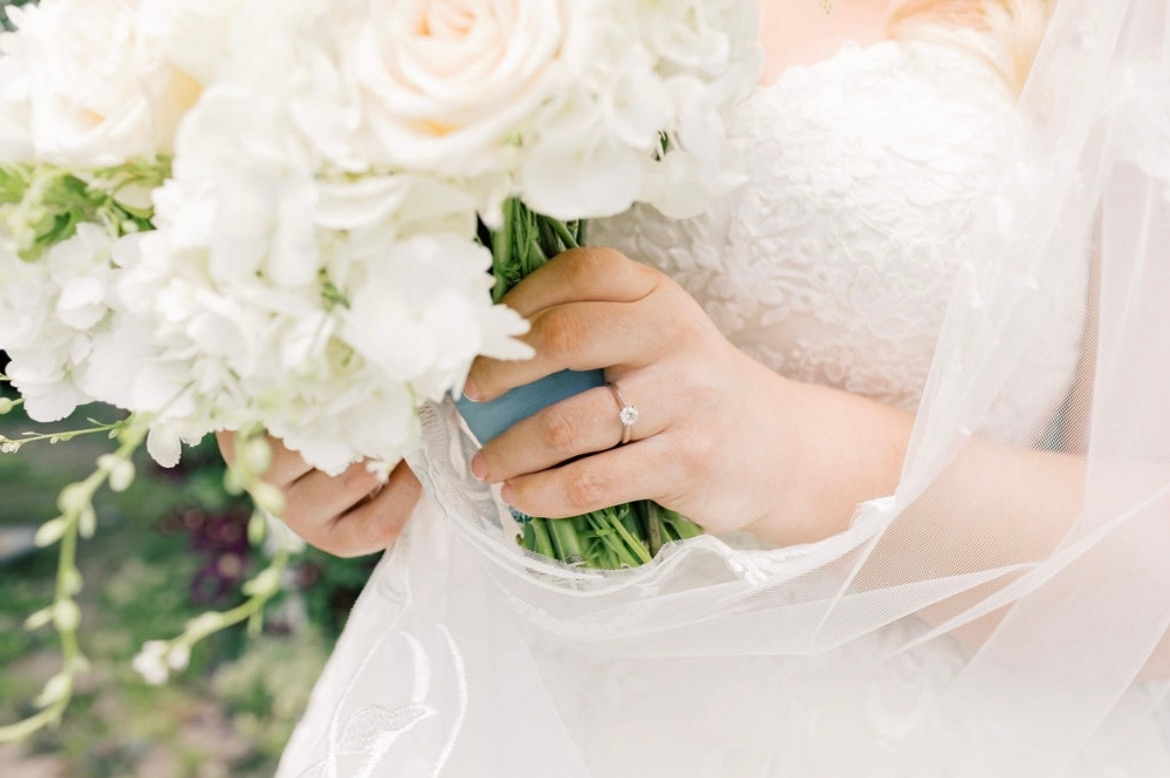 Luxury ivory, powder blue, and sage organic floral centerpiece for a wedding in the greater Seattle area