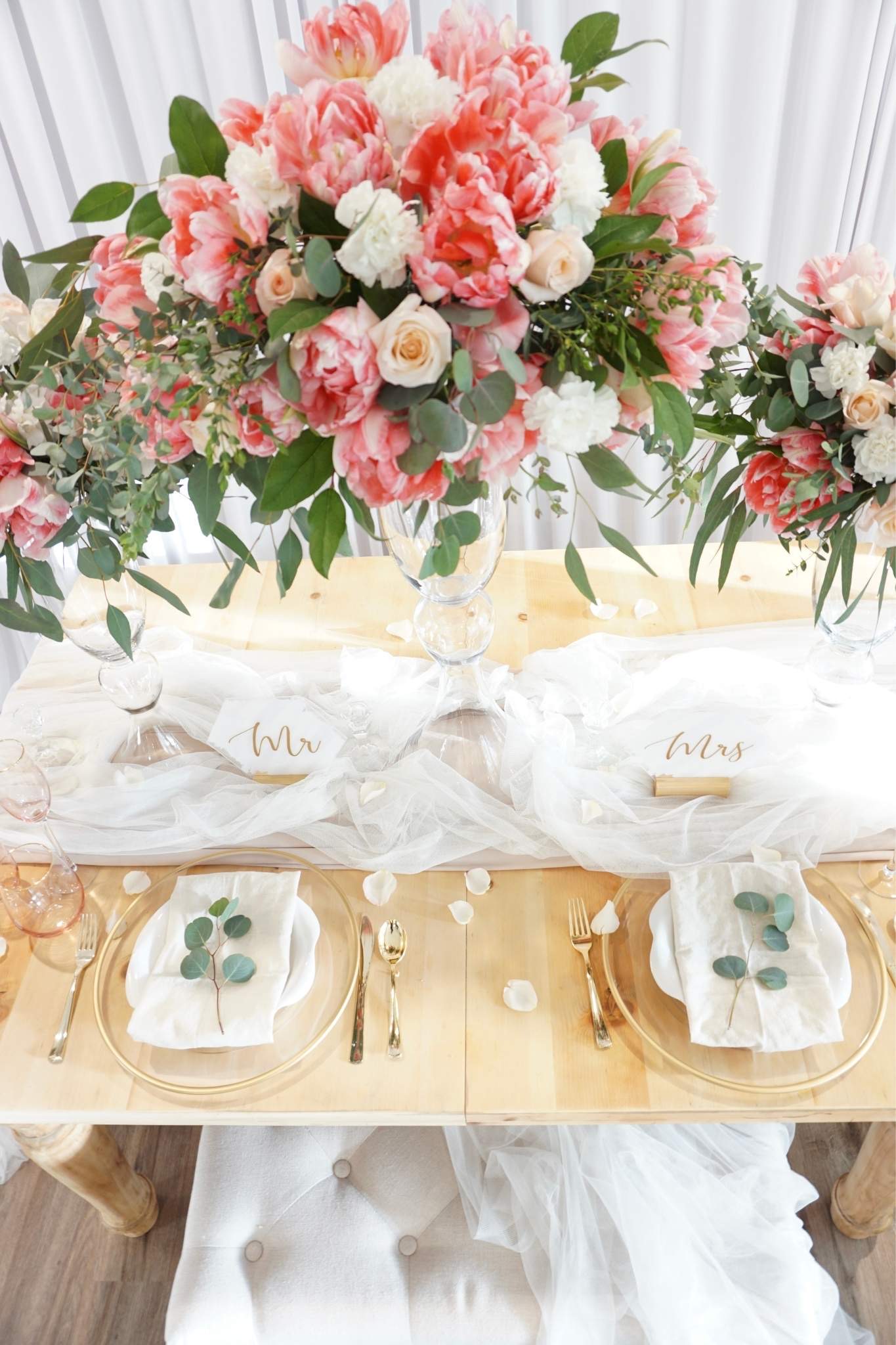 Luxury blush, ivory, and emerald organic floral styling for a wedding ceremony centerpiece in the greater Seattle area